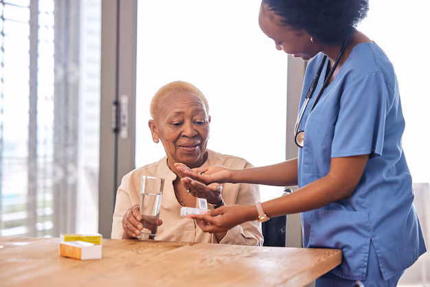 nurse giving health education at home in yaounde cameroon